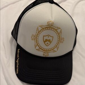 Black and White Trucker Hat with Gold Emblem